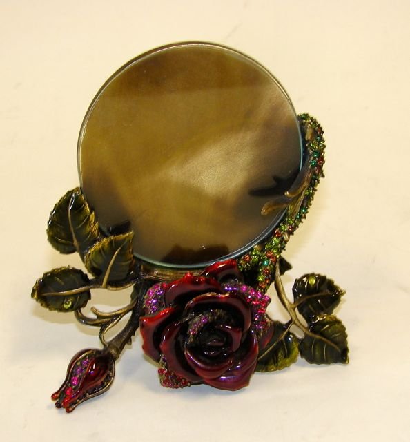 Jay Strongwater Rose Frame.: Height - 5". A round frame supported on a jeweled rose spray base. Complete with original box.