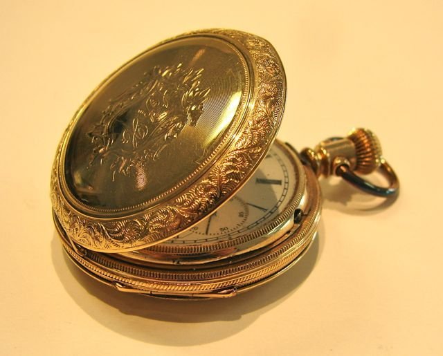 Elgin Pocket Watch. Gold Filled.: Minor crack on face.