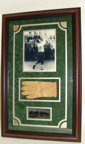 Bobby Jones, Jr. Authographed Golf Glove.: Certificate from Starabilia. Framed in a display frame.