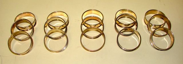 Fifteen (15) Sterling Silver Napkin Rings.: 4 troy ounces. Reed and Barton.