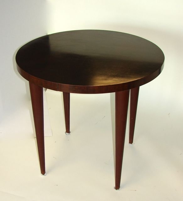 Gilbert Rohde Round Center Table for H. Miller.: Condition - Scratches on the top of the service of the table. H - 27", D - 30".