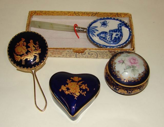 Four Assorted Dresser Articles.: Comprising two Limoges porcelain boxes and two small hand mirrors.