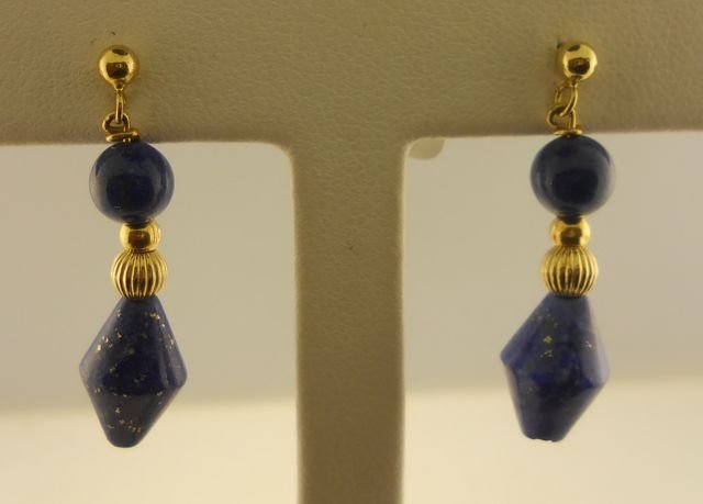 18K Yellow Gold Dangle Lapis Lazuli Earrings.: 18K Yellow Gold Dangle Earrings. The earrings have gold balls on top with lapis beads with a smooth gold ball and a slightly bigger one with ridges and a cone shaped lapis at the bottom. Notched Backs
