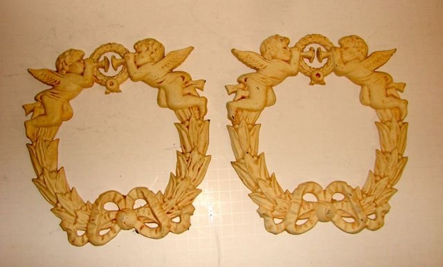 Pair (2) of Cast Iron Putti Wreaths Garniture.: H - 10", D - 10". Cast iron, painted white.