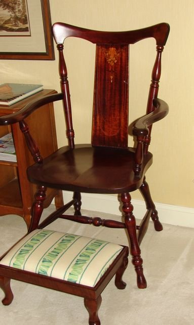 Edwardian Carved Walnut Open Armed Chair.: H - 38". Having a nicely inlayed slat back, turned legs and stretcher base.