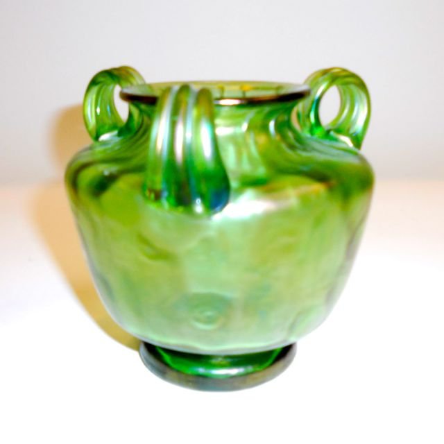 Loetz Style Iridescent Three Handle Vase.: H- 4.5". Having three loop handles. Green iridescent.