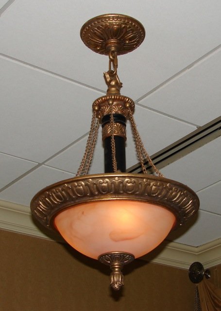 Set of Four (4) French Empire Style Light Fixtures: Height - 30 inches. Frosted glass domed shades. Due to renovations,these light fixtures may not be immediately available, but will be no later than November 22, 2013.