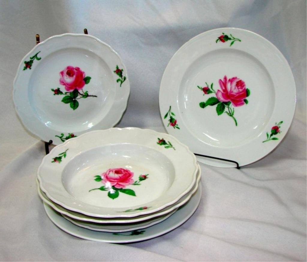 Set of six (6) Meissen Rose Dishes.: Set of six (6) Meissen Rose" dishes. Porcelain, glazed. Hand-painted with the "Meissen Rose" to the center, burgeons to the borders. Crossed swords mark under-glaze blue. Comprising 2 plates, diameter