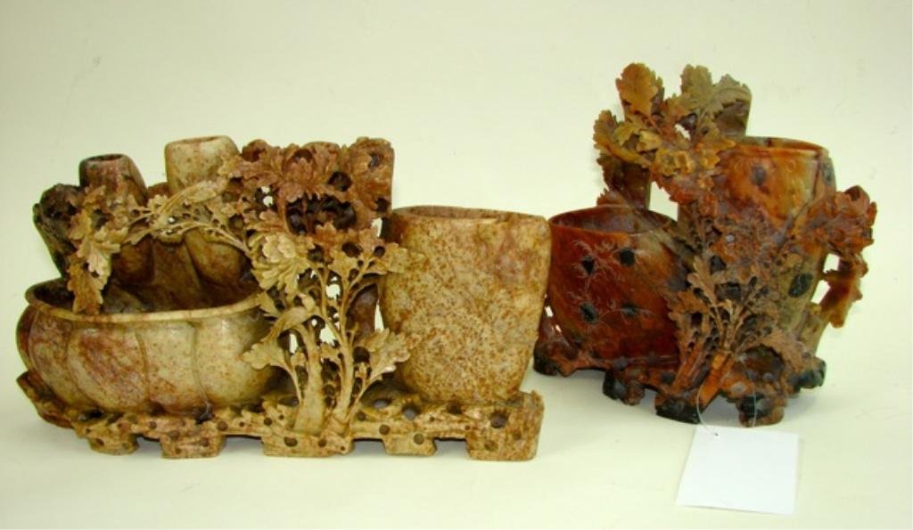 Two Large Chinese Carved Soapstone Vases.: The Red stone dimension are 8 x 9 inches and The spinach stone 7 x 12 inches.