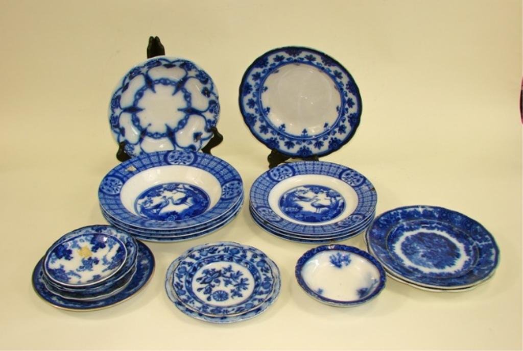 Assorted Flow Blue Plates and Bowls.