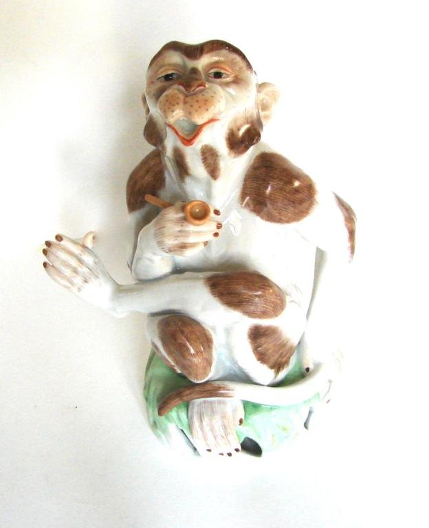 Dresden Porcelain Figurine. Smoking Monkey. 20th C.: Dresden porcelain figurine. A smoking monkey. 20th C. Height - 8 3/4 inches. Stamped hallmark on the bottom.