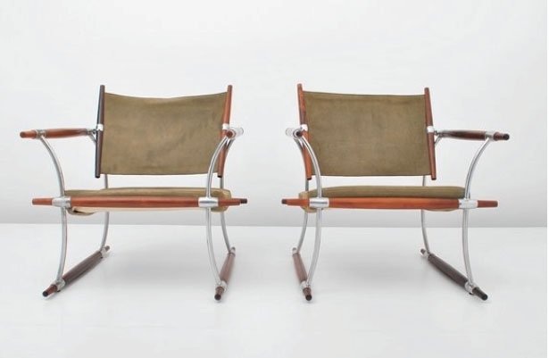 Pair Jens Quistgaard Lounge Chairs: Rosewood, suede, in excellent condition. Dimensions per chair is approximately27 x 27 x 27 inches.