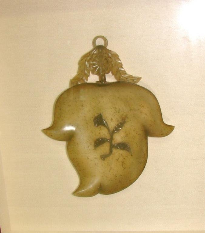 Chinese Carved Spinach Jade Leaf Form Bowl: Bowl is 7.5 inches long, framed in a shadow box frame. 13 x 12 inches. Condition. Small chip on the filigree handle.