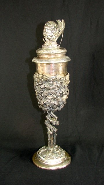 Russian Silver Covered Chalice.: 18.4 troy ounces. Hallmarked "MIM 84" on the base. Having an eagle mounted finial on the lid, the body with very high relief oak leaves on a double trunk form stem ending in a naturalistic base with h