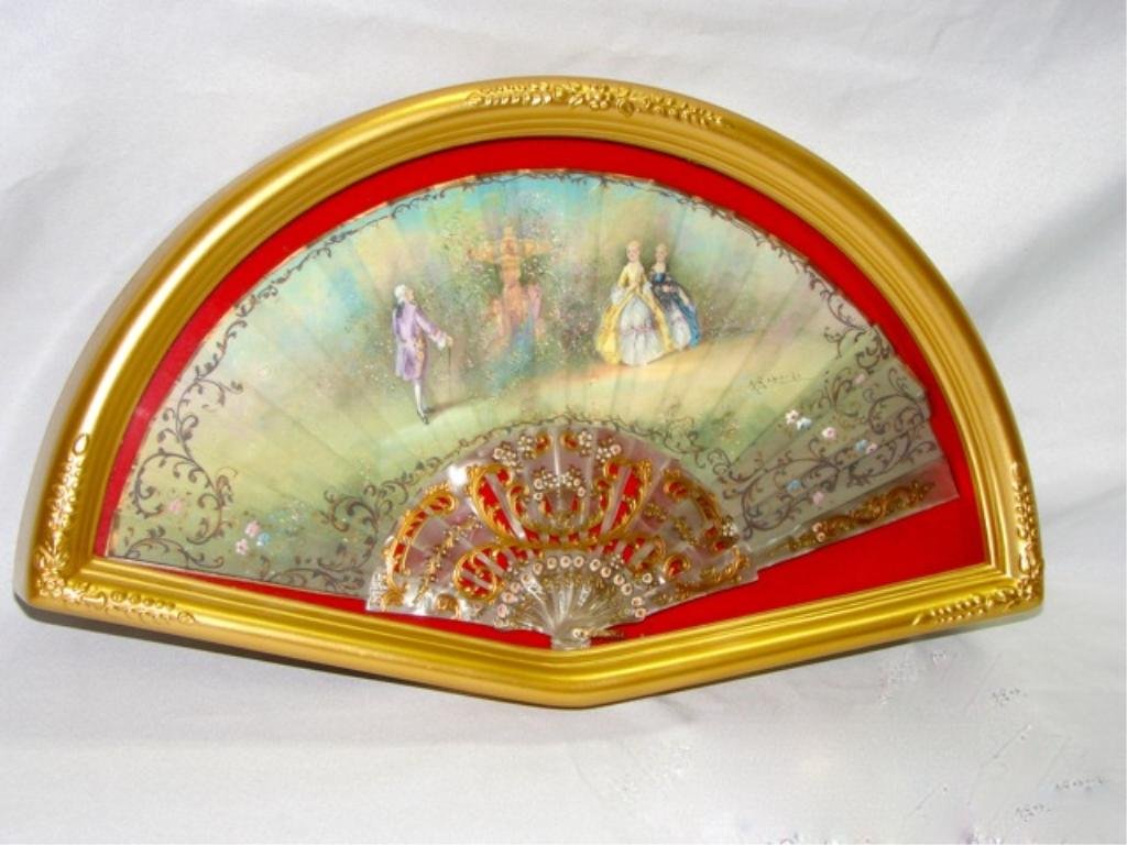 Framed Hand Painted Silk Fan, Spanish.: The stays of the fan are Mother-of-Pearl, nicely hand painted with a 18th C. courting scene, signed J. Gabarda. Shadow box frame.