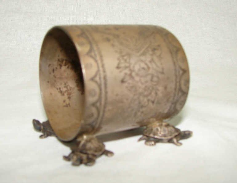 Tiffany & Co. Sterling Napkin Ring, 1883.: The Tiffany napkin with tortoise form feet, model # 4646M1462, monogrammed and dated 1883. 4.2 troy ounces.