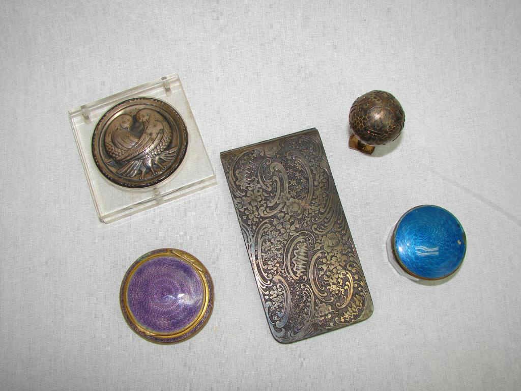Five (5) Assorted Ladies Articles. Compacts, Etc.: Including a powder jar, two contacts, a seal and note pad cover. The seal and notepad are sterling and total 5.2 troy ounces.