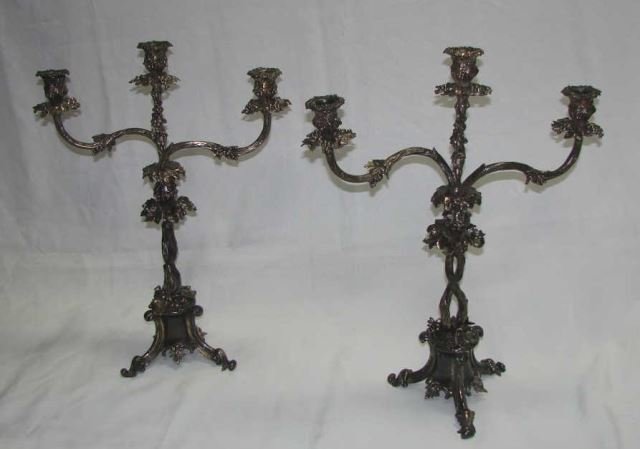 A Pair of Silver Plated Candelabras: Three arm candelabra with grapes and leaves. Height - 22 inches.
