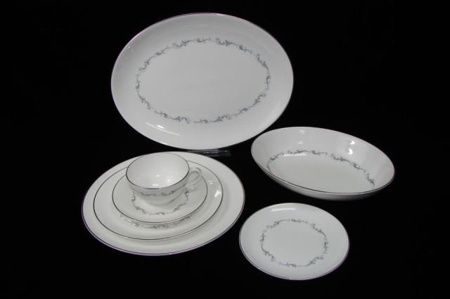 Set of Royal Doulton Coronet China Service: Consisting of twelve dinner plates (diameter-10 inches), eleven salad plates (diameter 8.5 inches), twelve dessert plates (diameter 6.5 inches), twelve cups and saucers, one serving plate (length 13 i