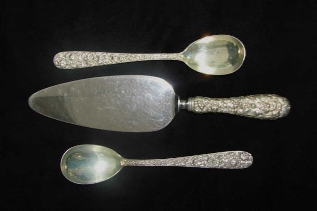 Three Piece Kirk & Son Sterling Steiff Rose: 4.2 troy ounces. Comprising a pair of serving spoons and a pie server.
