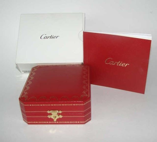 Cartier Trinity Travel Desk Clock, Original Case: Gold toned, this clock comes with the original case, papers and packing box. It is in MINT condition. Never used.