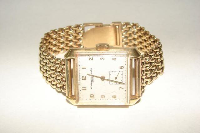 Vacheron Constantin 18K Gold Gent Watch: 18K yellow gold head, 14K Yellow gold custom mesh link band. Square refinished dial. Engraved on the back of the watch. Mechanical movement, running condition. Size 7.5, dial face 1 inches. 63.1 grams