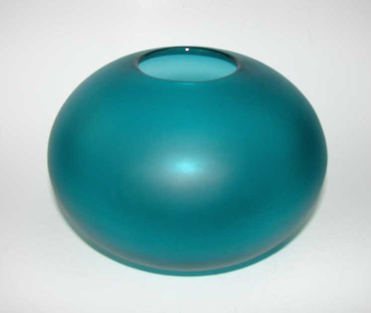 Anne Nilsson for Orrefors Donut Vase Signed: Satin teal glass, signed on the bottom. Height - 5 inches, diameter - 7 inches. Excellent condition.