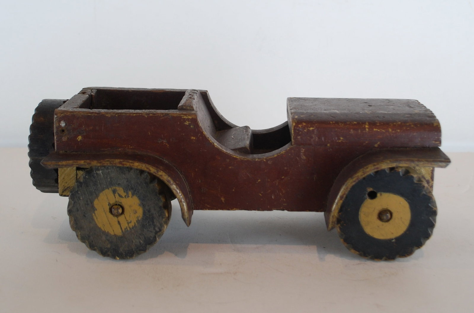 Willys Jeep: 1940s Willys Jeep Folk Art home made c.1950/60s Made of painted wood and and tin with wooden carved wheels, fair condition, paint chips, minor scratches overall Size- 30cm long x 14 cm wide x 11 cm hi