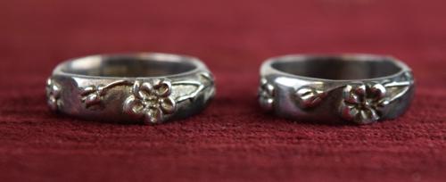 Pair of Tiffany and Company Rose Band Ring: Pair of Tiffany and Company Rose Band Ring. Both are marked "Tiffany & Co 2003 925". One ring is an 8 and the other is 8 1/2. 10 grams total weight.