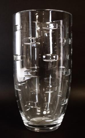 Waterford Crystal John Rocha Geo Vase: Large Waterford vase in Geo pattern, signed on underside John Rocha Waterford. 14"H. Minor chip along bottom edge, chip near bottom.