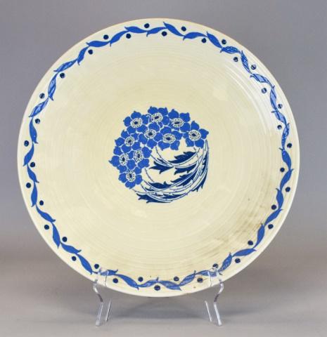 Charlotte Rhead for Crown Ducal Charger: Pottery charger by Charlotte Rhead for Crown Ducal. Blue flowers over a cream ground. Signed C Rhead and stamped Crown Ducal England on verso. 17 1/4"-diameter