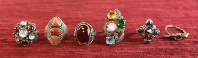 Group of Sterling Silver Semi Precious Stone Rings: Sterling Silver Ring with 4 Garnet. Size 9 1/4. 6.3 Grams Total. Sterling Silver Ring with 4 Brilliant Cut Stones and Diamond Chips . Size 6 1/2. 13 Grams Total. Sterling Silver Ring with 3 Red Jasper