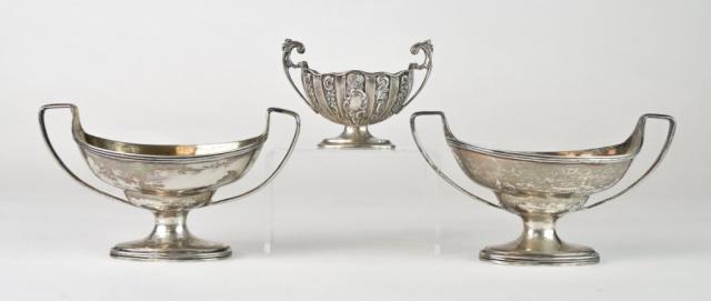 3 English Sterling Master Salts: 3 hallmarked English sterling open salts. Pair, with SH (Solomon Hougham) maker's marks, London, c. 1798; a single salt with repousse scroll decoration, Henry Matthews maker's mark, Birmingham, c. 189