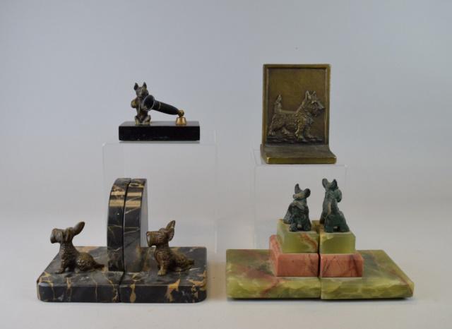 Grouping of Scottie Desk Items: 3 pairs of Scottie dog bookends and a Scottie pen holder. Signed B&H (Bradley & Hubbard) bronze bookends, 5 1/4"H; cold painted bronze Scotties on marble bookends, 4 1/2"H; patinated scotties on marbl