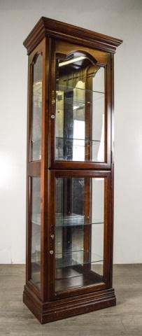 Mahogany Curio Cabinet: Mahogany curio cabinet . Two glass doors that open to separate cabinets. Each with three glass shelves 24" L X 12 1/2" W X 62" H With light fixture on the top