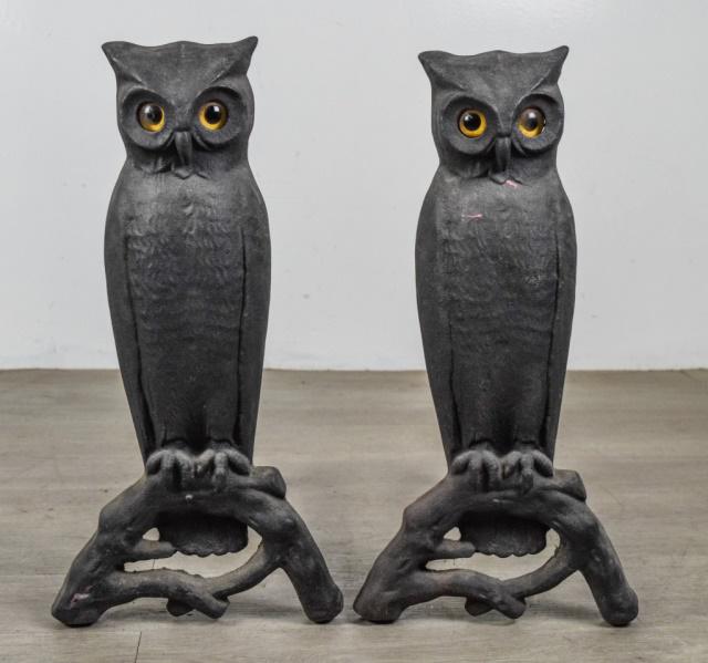 Pair of P.S. & W. Co. Owl Andirons: Peck, Stow & Wilcox (American, Connecticut & Ohio). Pair of cast iron owl andirons with inset glass eyes, each stamped P.S. & W. Co. Eyes glow when lit from behind. Each 21 1/2"H x 17"L