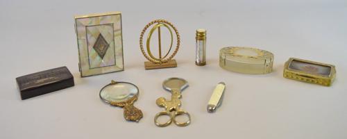 Grouping of Dresser Items & Accessories: Rooster cigar cutter, magnifier with artist's palette decoration on handle, gold tone frame, souvenir box, frosted glass box, mother of pearl card case with silver inset, Le Kid mother of pearl perfum
