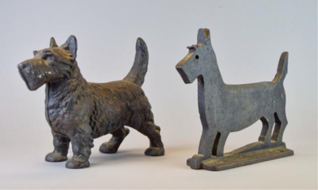2 Cast Iron Scottie Dog Doorstops: 2 cast iron Scottie dog doorstops. 10 1/2"L x 8 1/2"H and 10"L x 8 1/4"H