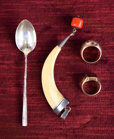 Grouping of Jewelry: Gold ring with diamond center stone and red stones, tested 18Kt, 6.2 grams with stones; 1970 class ring marked 10 Karat with red monogrammed S stone 6.6 grams with stone; bone pendant with sterling si