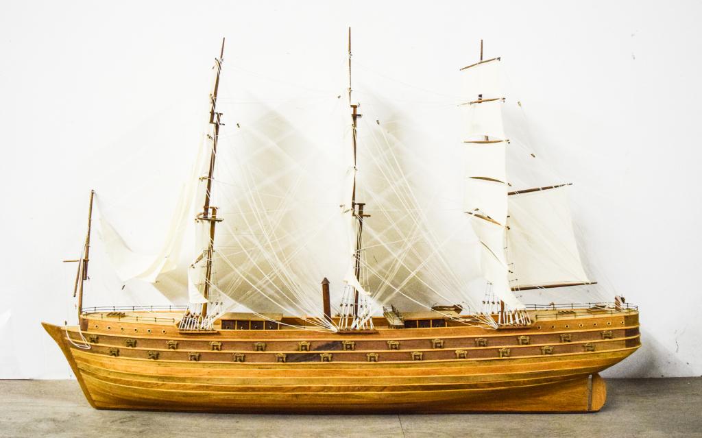 Large Wooden Clipper Ship Model: Front sails loose and partially detached, some minor warping to wood. 50"L x 32"H to top of sails