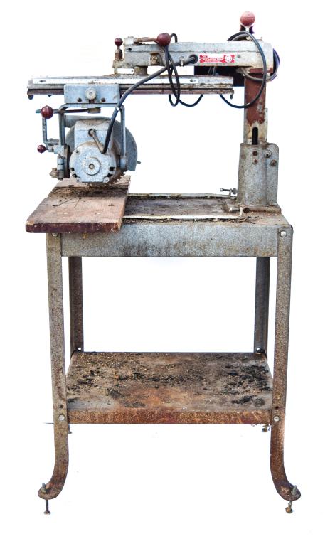 Rockwell Delta Radial Arm Saw: 28"L x 32"H x 18"W. With metal label Rockwell Manufacturing Co. Delta Power Tool Division. Serial number BN8442
