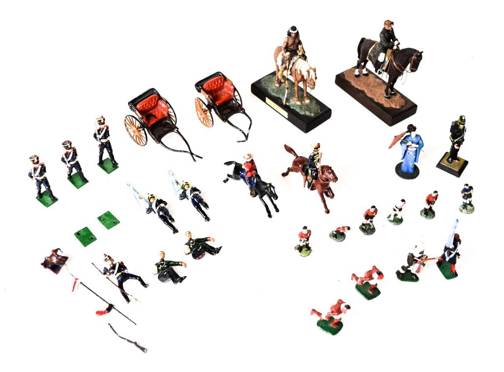 Group of Lead & Other Figures: Lead figures including 2 officers in carriages, 2 soldiers on horseback (1 with arm detached), 6 soldiers, 6 soccer players, 6 additional figures; and 2 figurines on horseback Indio Pampa S.XIX and Gr