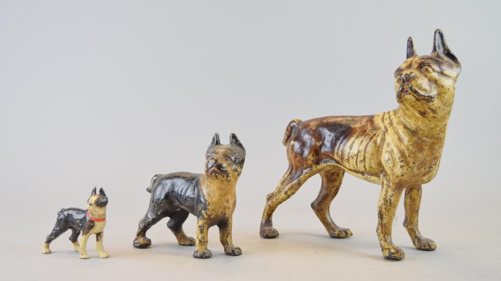 Grouping of Cast Iron Boston Terriers: Lot includes three Boston terrier dogs, wear appropriate with age, largest measures, 8"L x 10"H