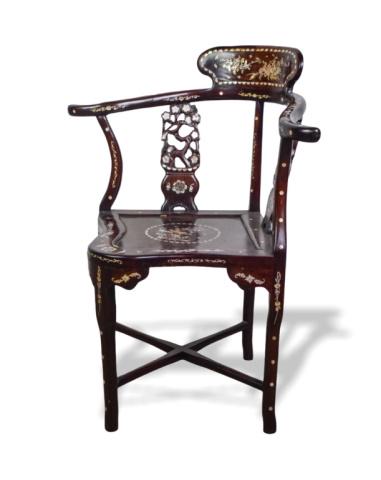 Carved & Inlaid Chinese Rosewood Corner Chair: Carved rosewood Chinese corner armchair, with horseshoe back and mother-of-pearl inlays throughout. 30 1/2"W x 23"D x 35"H. Small chip at front of seat.