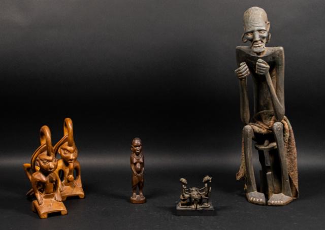 Lot of African Souvenir Art: 4 pieces of African Souvenir Art. One carved wood sculpture in the style of the yoruba tribes, depicting twins with a chain connecting them by their heads: 14" L x 10 1/4" H . One wooden sculpture of