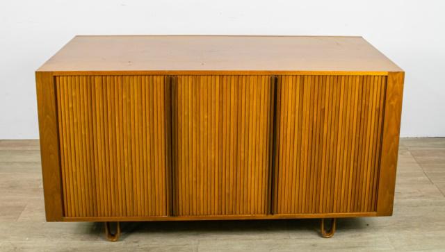 Edward Wormley for Dunbar Modern Cabinet: Edward Wormley (American, 1907-1995) for Dunbar Furniture. Mid-century modern cabinet, with tambour doors, on bentwood legs. Scratches and wear to interior, nicks and scratches throughout. 62" L X 24 