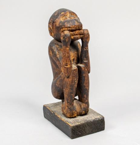 Bafo Tribe Deity Statue Cameroon: One Bafo from Cameroon wooden statue of Monkey or Deity: 8" H x 3" W x 1 3/4" L . Wear from age.