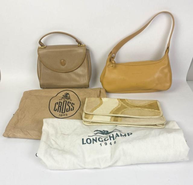 Lot of Three Designer Handbags: Lot includes Mark Cross taupe pebbled leather handbag, flap magnetic closure, gold tone hardware, protective metal feet, three interior compartments, includes dust bag, marks and minor wear consistent