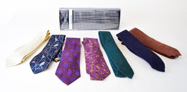 7 Perry Ellis Designer ties and cummerbund: 7 Perry Ellis ties including a bird and owl design and floral designs as well as solids and wool ties also includes checker boxed set with cummerbund. size 1