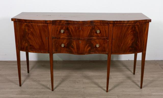Federal Style Veneered Sideboard: Federal Style veneered sideboard. American, late 19th / early 20th Century. Curving front with two front drawers and locking side cabinets with original key, inlaid feet and front. Heavily worn and wa